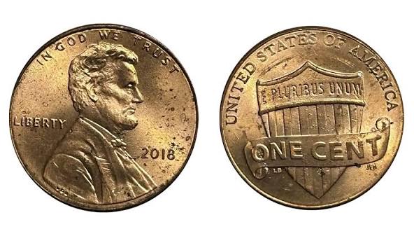 Group of 2018 Lincoln Shield pennies showing various grades from circulated to gem uncirculated